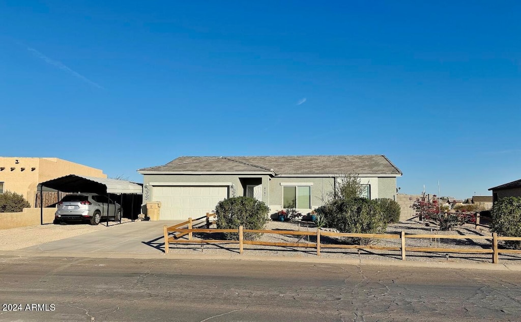 view of front of property with a carport