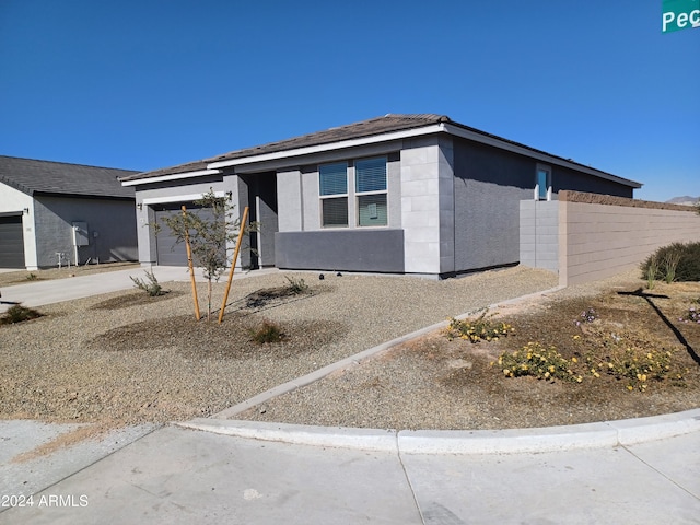 view of front of home featuring a garage