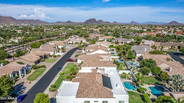 birds eye view of property with a residential view and a mountain view