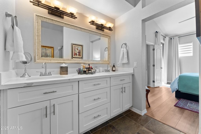 7887 N 16th St Unit 226, Phoenix, AZ 85020 - full bath with double vanity and baseboards