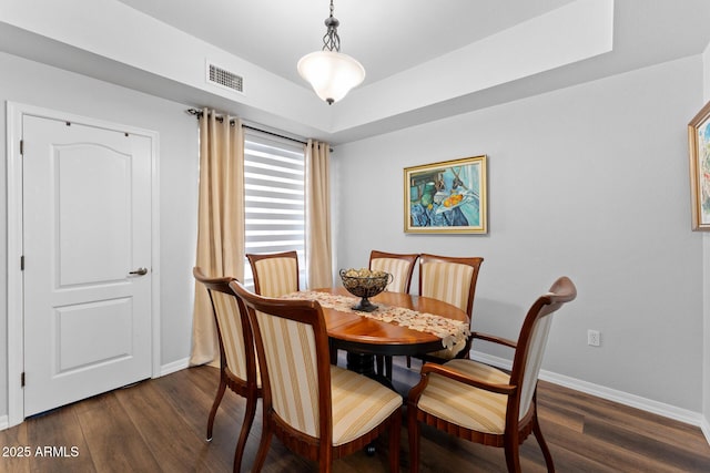 7887 N 16th St Unit 226, Phoenix, AZ 85020 - dining room with baseboards and dark wood-style flooring