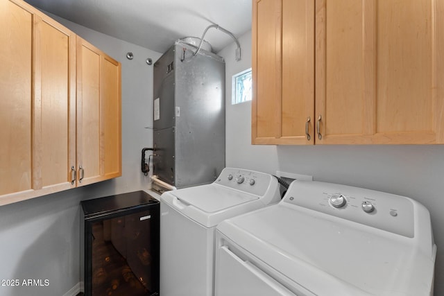 7887 N 16th St Unit 226, Phoenix, AZ 85020 - laundry room featuring washer and dryer, cabinet space, and heating unit