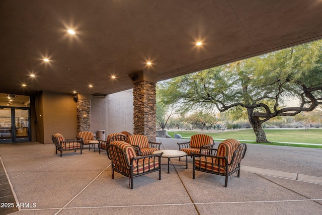 patio terrace at dusk with outdoor lounge area