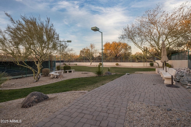 surrounding community with a patio area