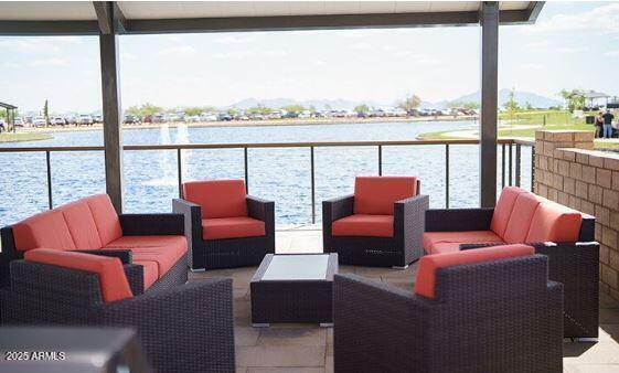 953 W Ridge Rd, Apache Junction, AZ 85120 - view of patio / terrace featuring an outdoor hangout area and a water view
