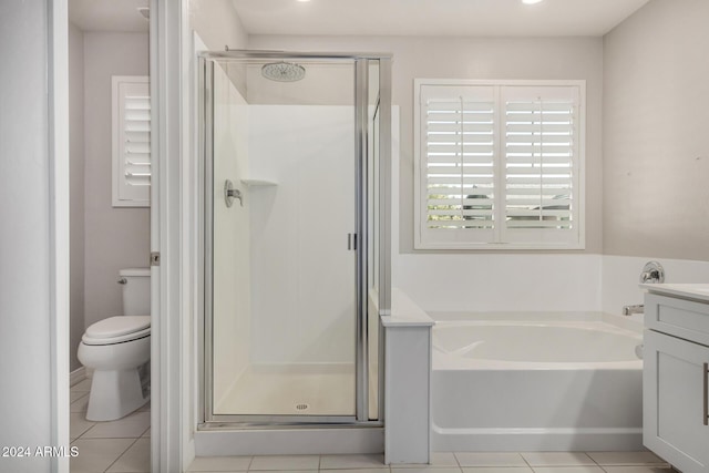 full bathroom featuring tile patterned floors, vanity, toilet, and plus walk in shower