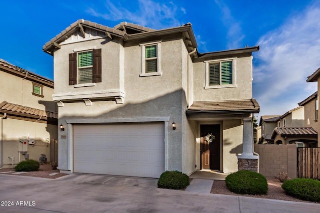 view of front of home with a garage