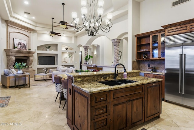 4401 E Taurus Pl, Chandler, AZ 85249 - kitchen with visible vents, ornate columns, built in features, a sink, and built in fridge