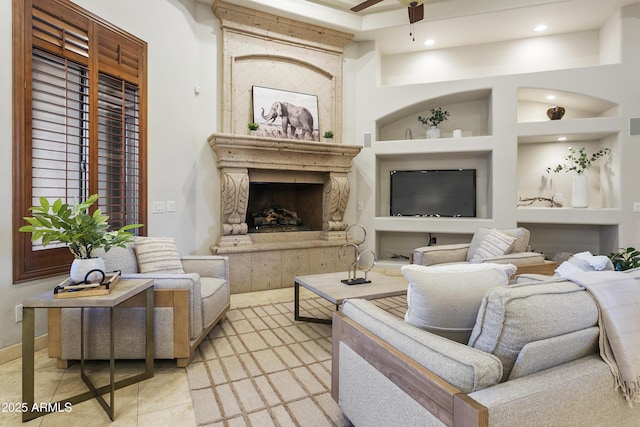 4401 E Taurus Pl, Chandler, AZ 85249 - living room with a large fireplace, recessed lighting, ceiling fan, and built in shelves