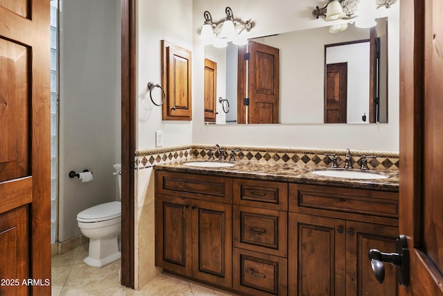 4401 E Taurus Pl, Chandler, AZ 85249 - bathroom featuring toilet, a sink, double vanity, and tile patterned flooring