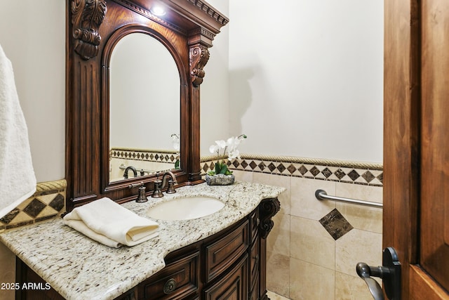 4401 E Taurus Pl, Chandler, AZ 85249 - bathroom with tile walls, a wainscoted wall, and vanity