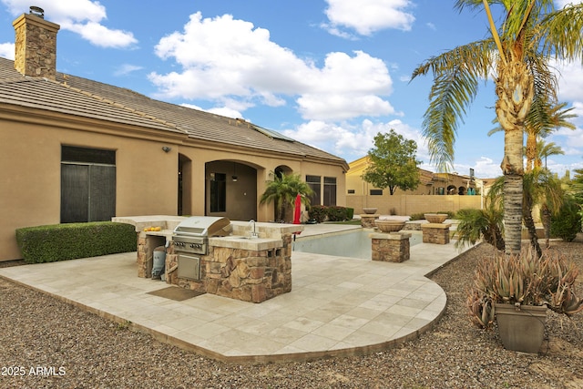 4401 E Taurus Pl, Chandler, AZ 85249 - view of patio featuring a grill, area for grilling, fence, and a sink
