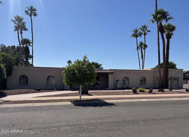 1124 N Villa Nueva Dr, Litchfield Park, AZ 85340 - view of front of home featuring stucco siding