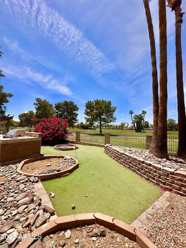 1124 N Villa Nueva Dr, Litchfield Park, AZ 85340 - view of yard featuring a putting green