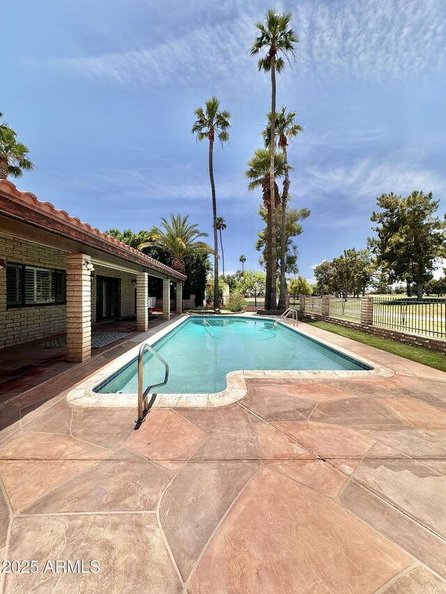 1124 N Villa Nueva Dr, Litchfield Park, AZ 85340 - view of swimming pool featuring a patio