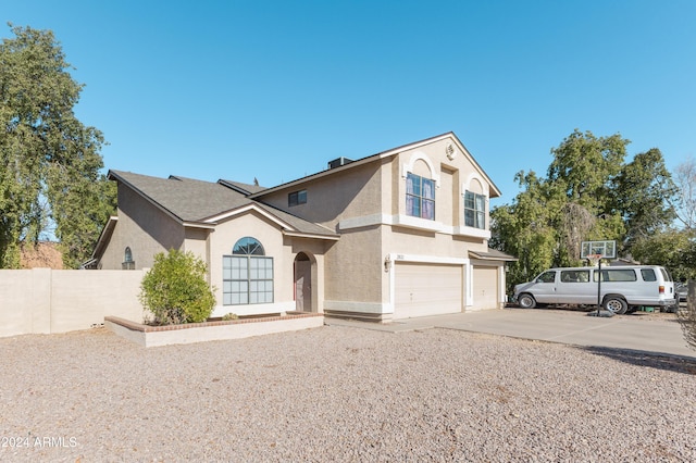 front of property featuring a garage