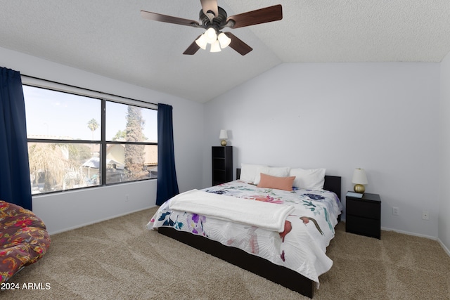 carpeted bedroom featuring ceiling fan and lofted ceiling