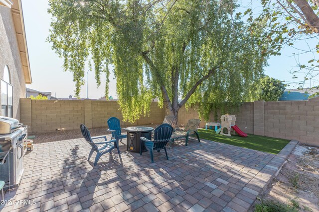 view of patio with a playground