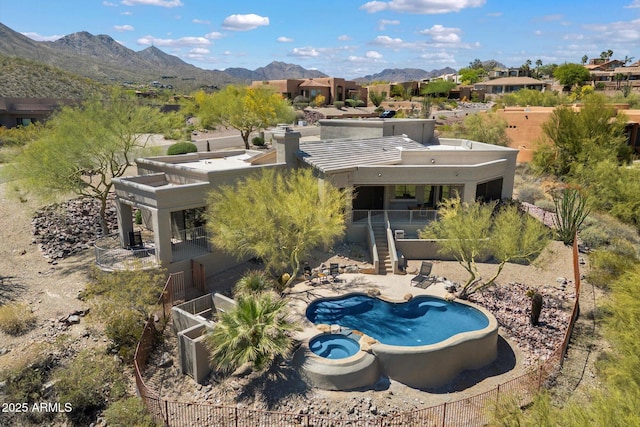 drone / aerial view featuring a mountain view