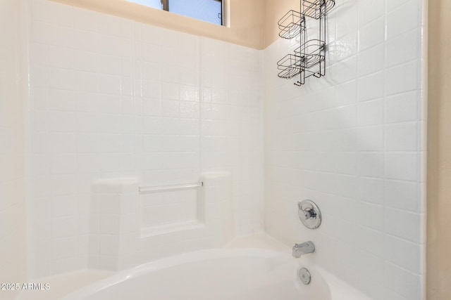 bathroom with shower / washtub combination