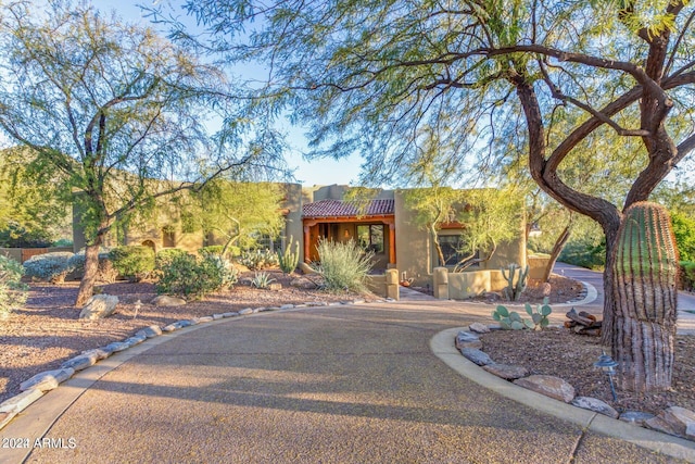 view of adobe home