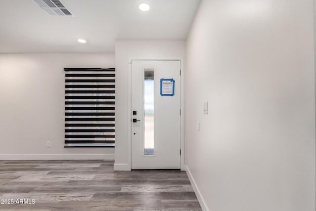 3008 W Michigan Ave, Phoenix, AZ 85053 - entrance foyer featuring recessed lighting, baseboards, visible vents, and wood finished floors
