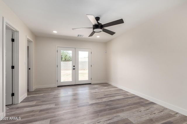 3008 W Michigan Ave, Phoenix, AZ 85053 - unfurnished room with ceiling fan, french doors, visible vents, baseboards, and recessed lighting