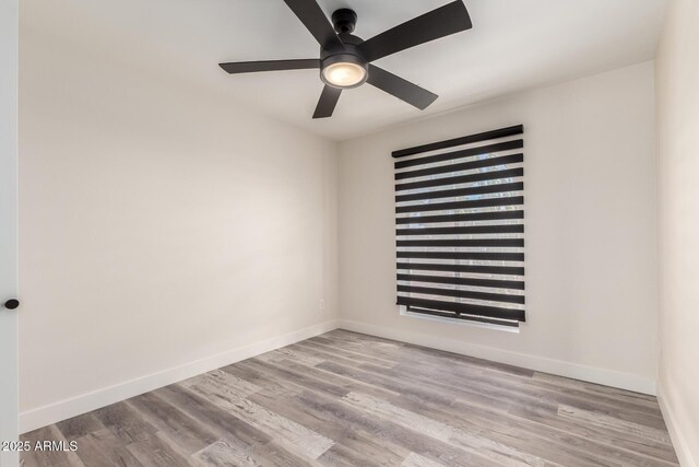 3008 W Michigan Ave, Phoenix, AZ 85053 - unfurnished room featuring baseboards, ceiling fan, and wood finished floors
