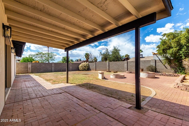 3008 W Michigan Ave, Phoenix, AZ 85053 - view of patio / terrace with a fire pit and a fenced backyard
