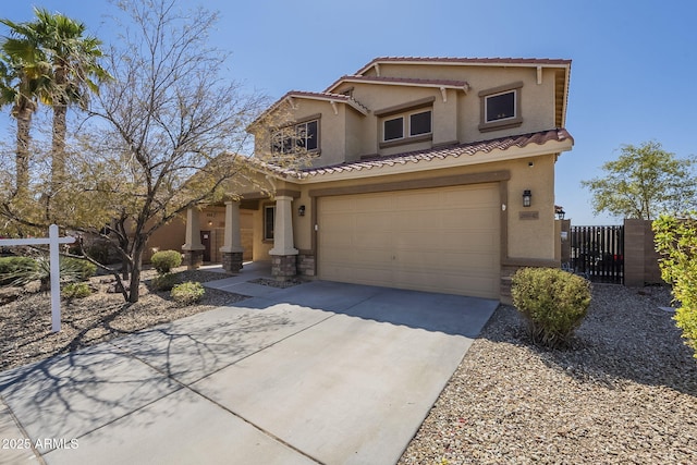 26842 N 176th Ln, Surprise, AZ 85387 - view of front facade featuring a tiled roof, stucco siding, fence, an attached garage, and driveway