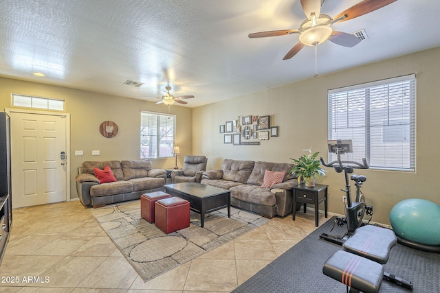 26842 N 176th Ln, Surprise, AZ 85387 - living area featuring light tile patterned floors, visible vents, and ceiling fan