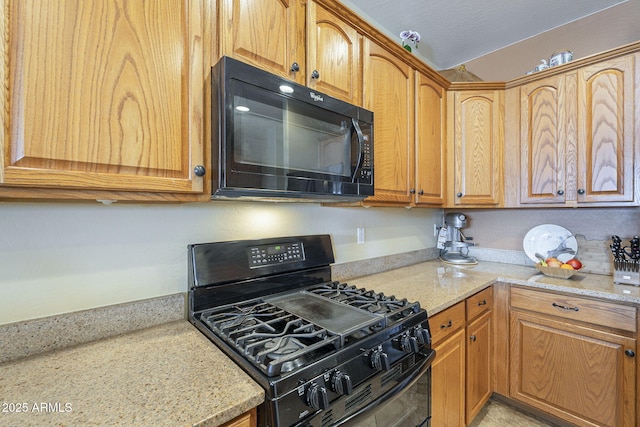 26842 N 176th Ln, Surprise, AZ 85387 - kitchen featuring black appliances and light stone countertops