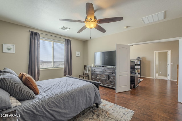 26842 N 176th Ln, Surprise, AZ 85387 - bedroom featuring baseboards, dark wood-style flooring, ceiling fan, and visible vents