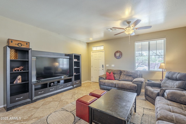 26842 N 176th Ln, Surprise, AZ 85387 - living area featuring ceiling fan, baseboards, and visible vents