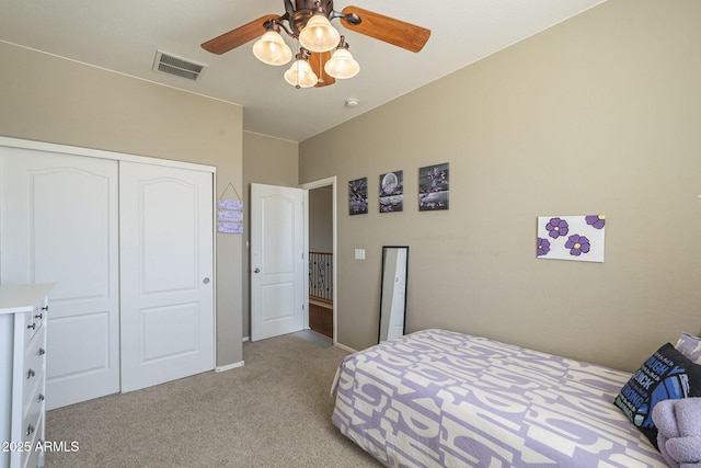 26842 N 176th Ln, Surprise, AZ 85387 - bedroom with a closet, light colored carpet, a ceiling fan, and visible vents