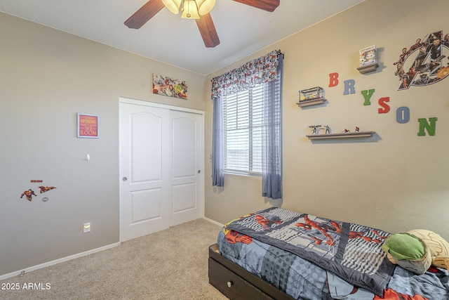 26842 N 176th Ln, Surprise, AZ 85387 - carpeted bedroom featuring a closet, baseboards, and a ceiling fan