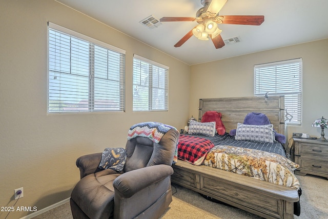 26842 N 176th Ln, Surprise, AZ 85387 - bedroom with visible vents, multiple windows, carpet flooring, and a ceiling fan