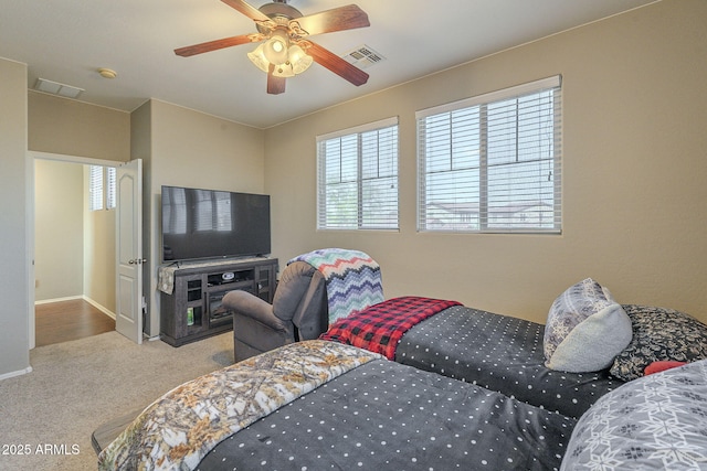 26842 N 176th Ln, Surprise, AZ 85387 - bedroom with visible vents, baseboards, a ceiling fan, and carpet floors