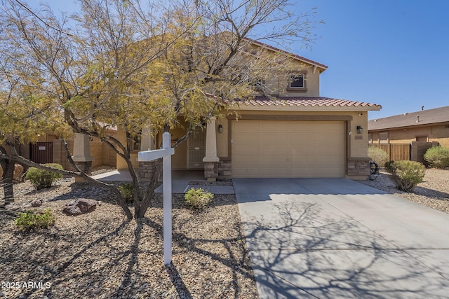 26842 N 176th Ln, Surprise, AZ 85387 - view of front facade featuring stucco siding, fence, a tile roof, an attached garage, and concrete driveway