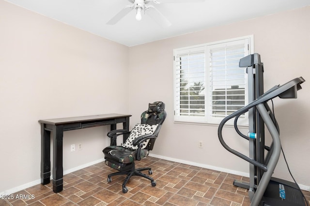 exercise area with ceiling fan