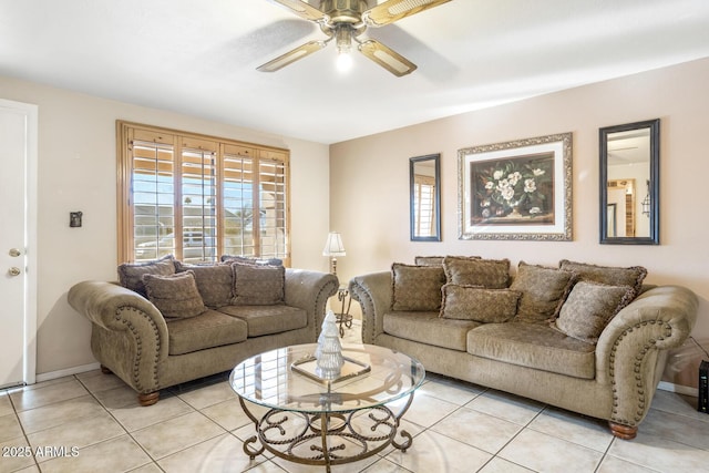 living room featuring ceiling fan and light tile patterned flooring