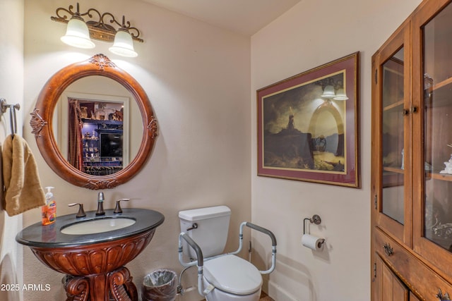 1702 W Monterosa St W, Phoenix, AZ 85015 - half bathroom with toilet and a sink