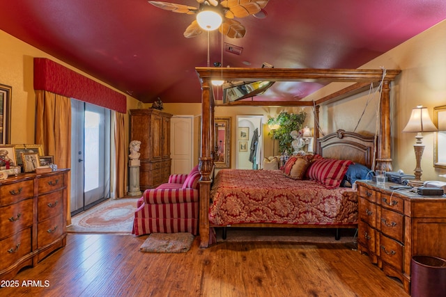 1702 W Monterosa St W, Phoenix, AZ 85015 - bedroom featuring lofted ceiling, wood finished floors, and access to exterior