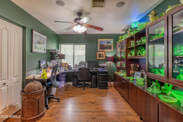 1702 W Monterosa St W, Phoenix, AZ 85015 - home office with a ceiling fan and hardwood / wood-style flooring