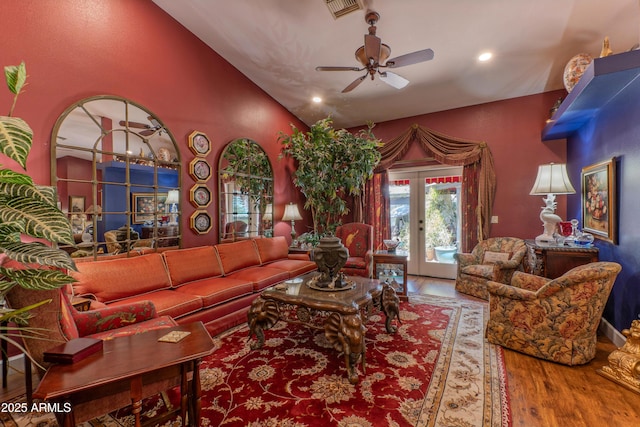 1702 W Monterosa St W, Phoenix, AZ 85015 - living room featuring wood finished floors, a ceiling fan, french doors, vaulted ceiling, and recessed lighting