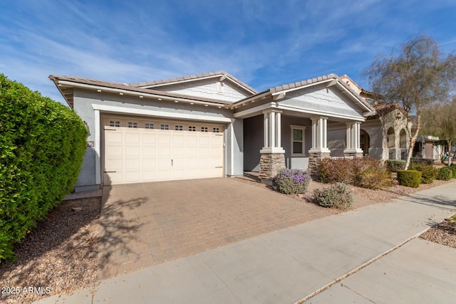 view of front of home with a garage