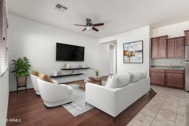 living room with ceiling fan