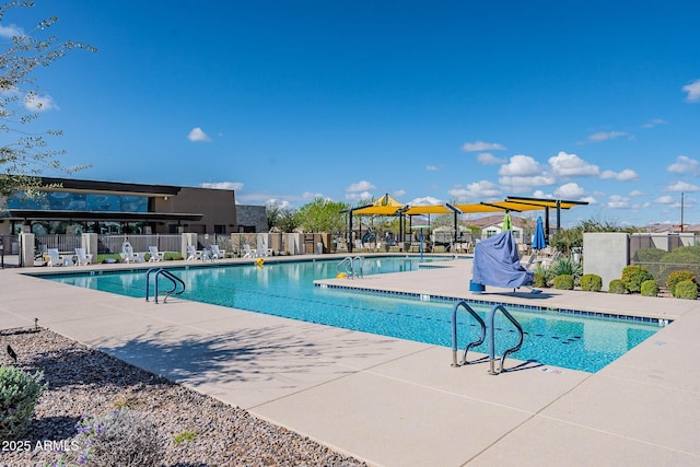 view of swimming pool featuring a patio