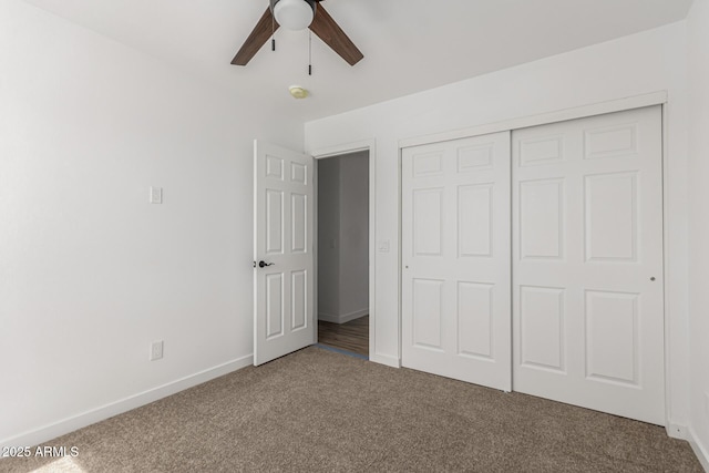 11474 N 79th Dr, Peoria, AZ 85345 - unfurnished bedroom with carpet, baseboards, a closet, and ceiling fan