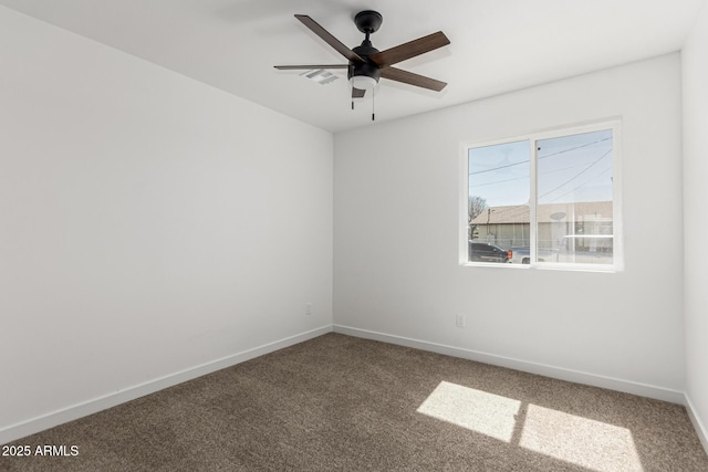 11474 N 79th Dr, Peoria, AZ 85345 - carpeted spare room with baseboards and ceiling fan
